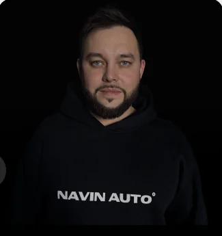Максим Навин